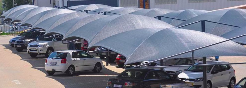 Grey netting shadeport installed over a double parking bay in Cape Town